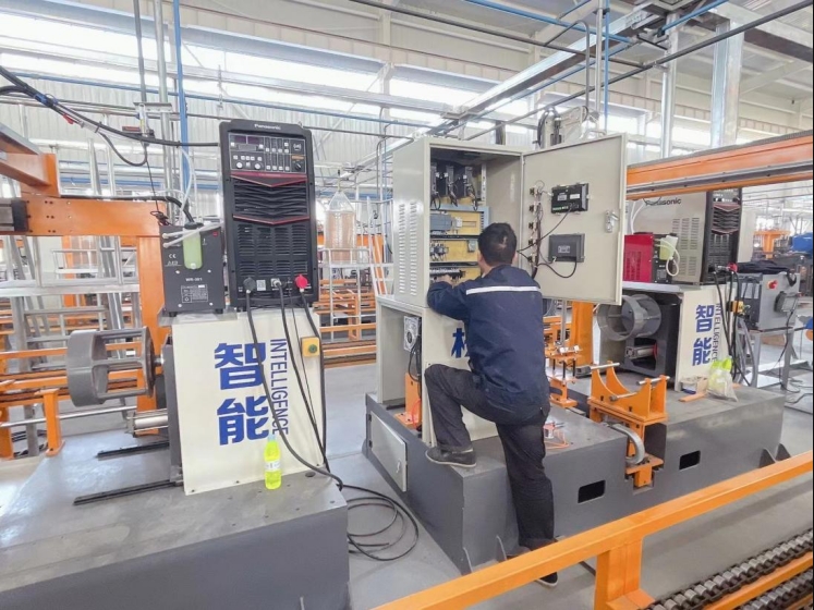 The ring welder is operating the ring welding machine